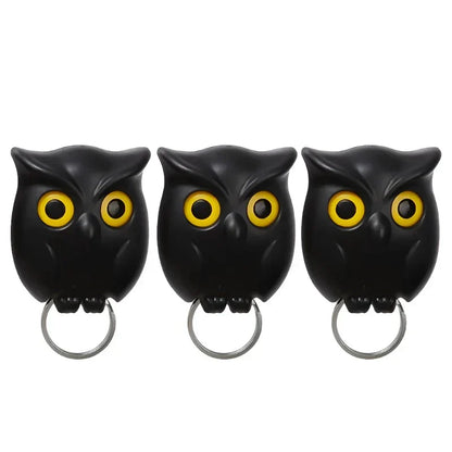 Black owl magnetic key holders with yellow eyes, durable ABS material, strong magnets.