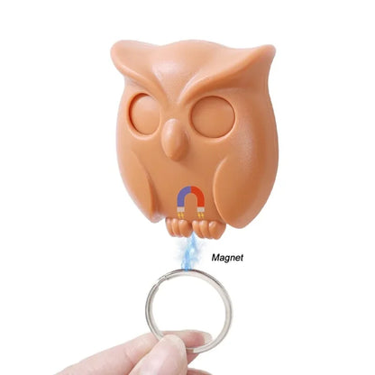 Owl-shaped magnetic key holder in durable ABS with strong magnet, perfect for home decor.