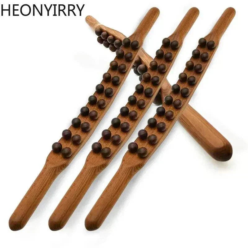 Beech wood Gua Sha stick for whole body massage, featuring ergonomic concave and convex surfaces for muscle relief and therapy.