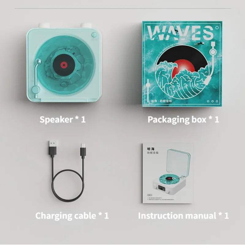 Waves Bluetooth Vintage Player with packaging, charging cable, and instruction manual.